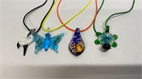 (4) glass pendant on string necklaces