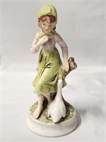 PORCELAIN FIGURINE- A GIRL IN GREEN, AND HER