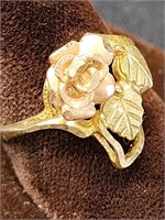 10k gold ring with rose and leaves design.