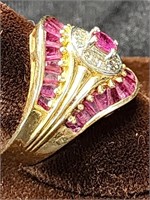 10k Gold ring with rhodolite in sunburst style.