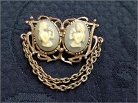 Double cameo brooch