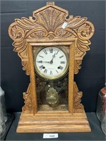 The New Haven Clock Co. Wooden Mantle Clock.