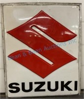 Large plastic Suzuki sign