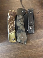 Three pocket knives