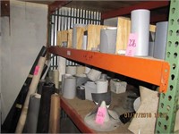 2 shelves: rubber membrane, rolls of shingle,