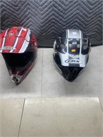 Pair of helmets-  red one is extra small, gray