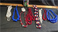 Red, white & blue costume necklaces