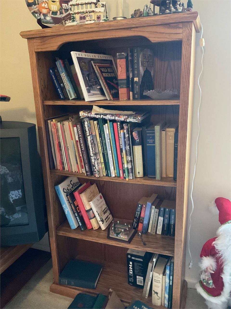 Oak book case with contents