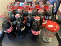 Coca-Cola Bottles and Sugar.