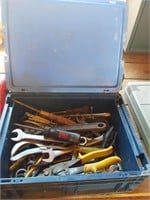 tool box and a plastic case with tools