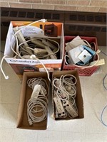 4- Boxes full of Electrical Power Strips