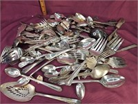Variety of silverware and serving utensils