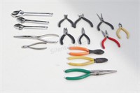 Assortment of Adjustable Wrenches and Pliers