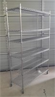 (Z) 6 Shelf Metal Storage Rack On Wheels. (75.5"