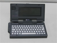 7.5"x 4"x 1" Vtg Atari Portfolio Palmtop Powers On