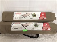 Two Coleman trail head II cots extrawide military