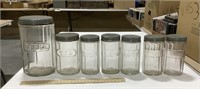 7 Glass canisters 7in - 5in