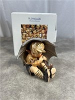 Hummel figurine called Umbrella Boy, numbered