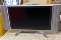 25in Sharp TV with remote control
