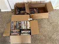Two Boxes of Assorted DVDs and CDs