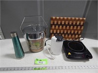 Cutting board; small thermos; ice bucket; coffee g