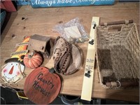 baseball glove, log house, metal sign