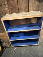 small shelf with rollers