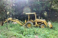 Ford backhoe with bucket and scoop AS IS