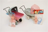 Two Steel Baby Carriages with Dolls
