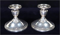 Pair, Sterling silver weighted candle sticks,