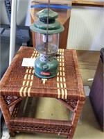 COLEMAN LANTERN AND WICKER STYLE TABLE