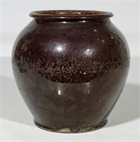 Redware crock, dark glaze, shaped sides,