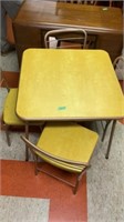 Metal folding table with 4 chairs (30in x 30in)