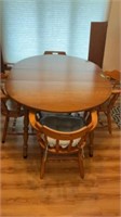 Table, 4 chairs, 1 leaf (56in x 44in)