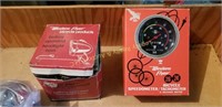 vintage bicycle light and speedometer
