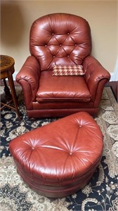 2 matching leather chairs with ottomans