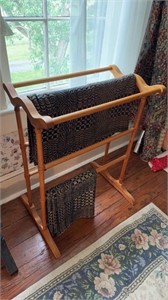 Wood quilt rack with two blue and white material,