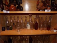 ASSORTMENT OF GLASS BOTTLES & JARS