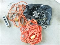 3 extension cords and power strip in bag