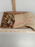 Empty brass 45 colt shells w/ Burlap bag