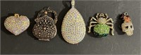 Five Betsy Johnson pendants