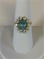 14K GOLD RING SIZE 7.5 WITH BLUE STONE POSSIBLY