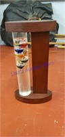 Vintage glass galileo thermometer with stand