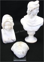 Two Marble Busts and Stone Head Decoration