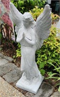28" angel, heavy coating over a plaster
