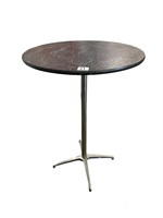Bar height table. 42in tall x 29in diameter. Used