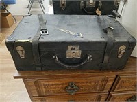 Vintage luggage with straps