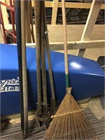 gardening hand tools, rake, post hole digger