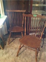 Two wood dining room chairs, missing a spindle