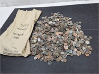 Over 12 lbs. Mutilated Coins & Canadian